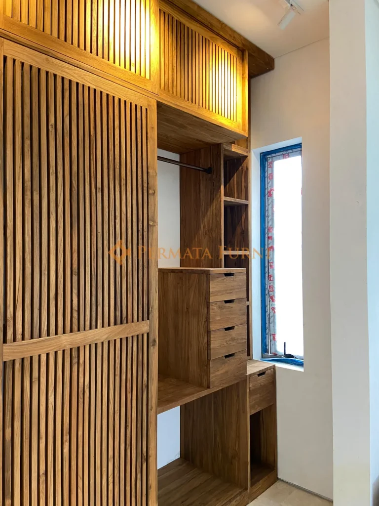 Custom modern minimalist wardrobe made from recycled teak wood, featuring natural warm tones and clean vertical lines, designed by Permata Furni for AA House in Cinere, Depok, 2025