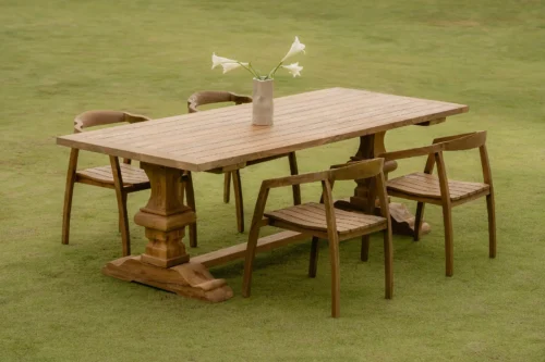 Reclaimed teak outdoor dining table and chairs for resort and hotel garden area